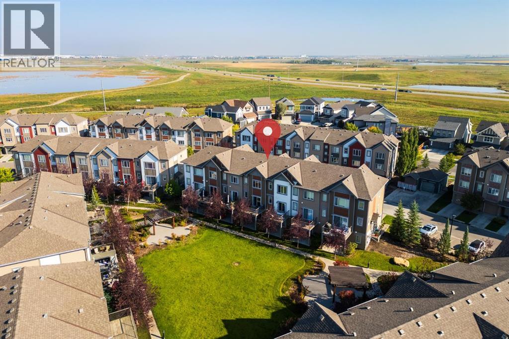 107 Copperpond Villas Se, Calgary, Alberta  T2Z 5B9 - Photo 1 - A2258480