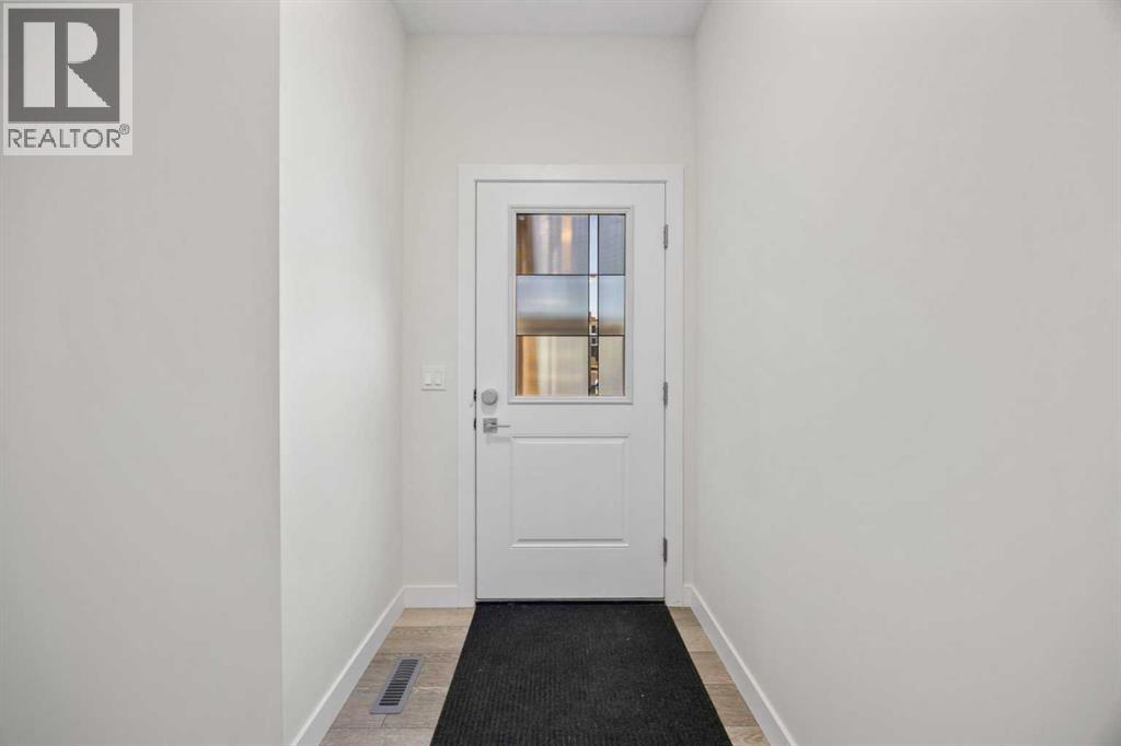 105 Creekstone Path Sw, Calgary, Alberta  T2X 4P7 - Photo 2 - A2239472