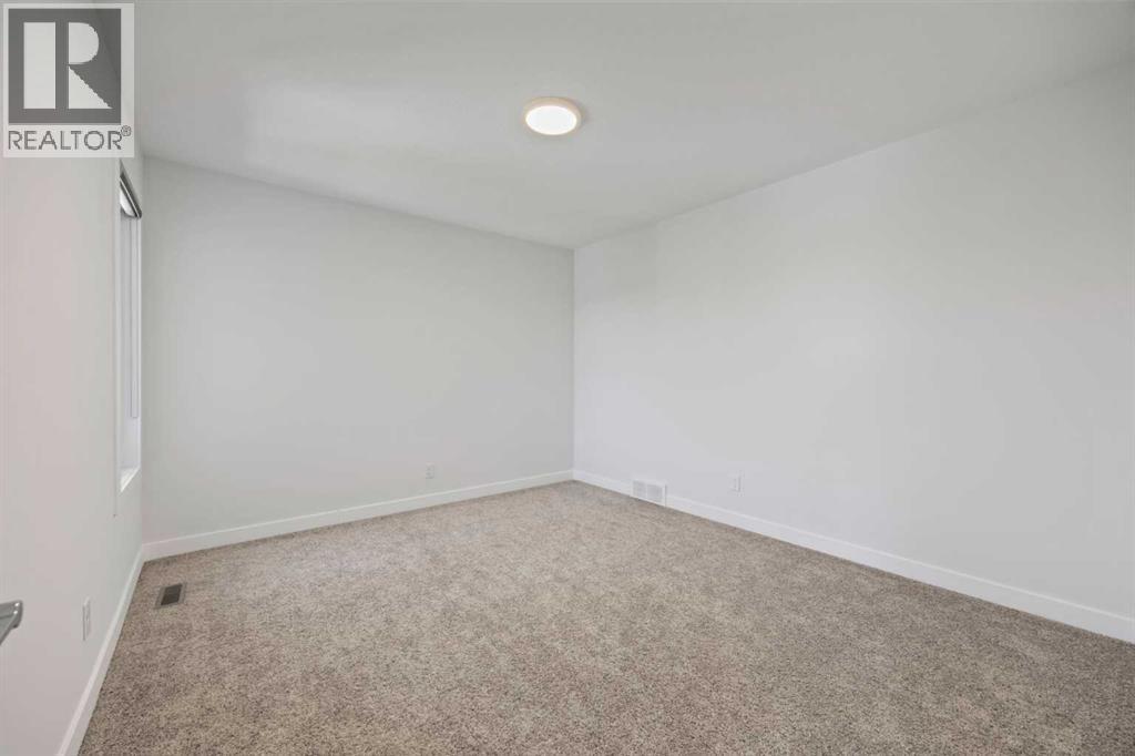 105 Creekstone Path Sw, Calgary, Alberta  T2X 4P7 - Photo 38 - A2239472
