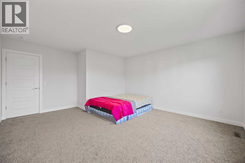 105 Creekstone Path Sw, Calgary, Alberta  T2X 4P7 - Photo 29 - A2239472