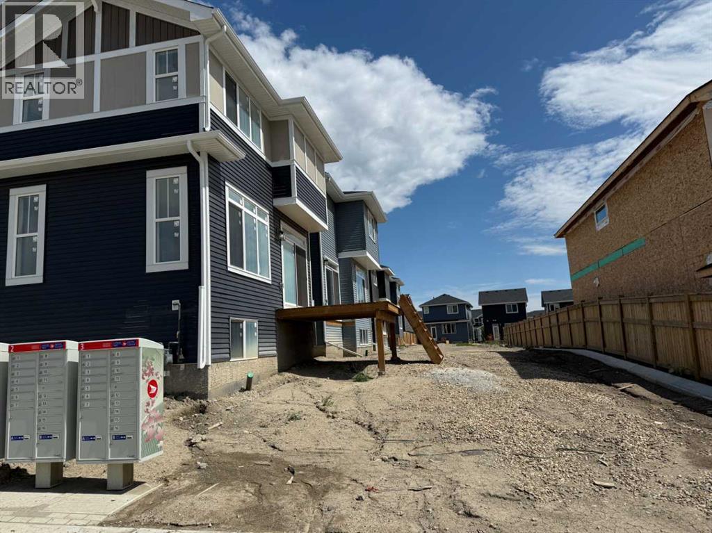 140 Sundown Crescent, Cochrane, Alberta  T4C 1Y3 - Photo 5 - A2204804