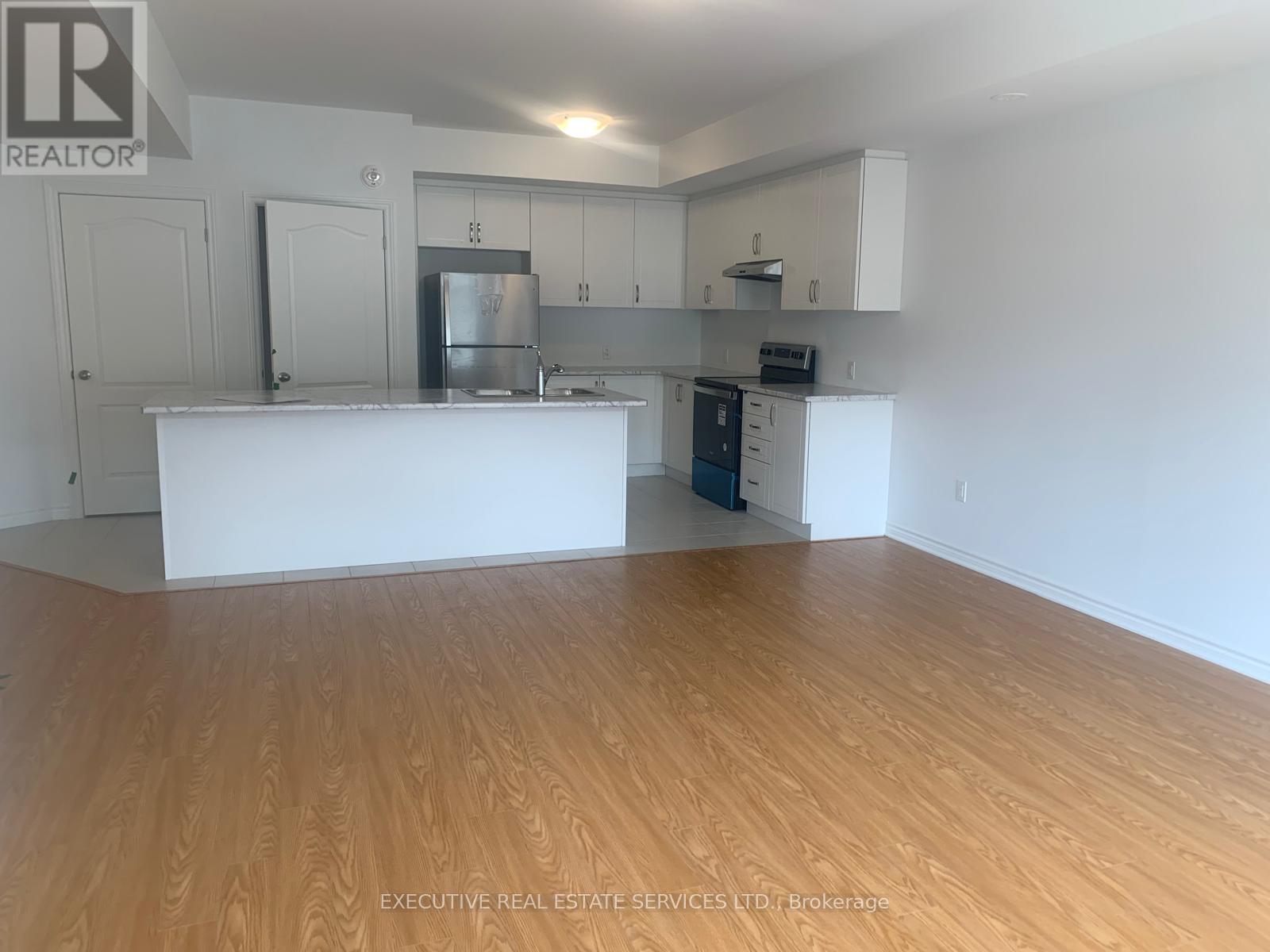 # 302 - 439 Dougall Avenue, Caledon, Ontario  L7C 4L5 - Photo 2 - W12415745