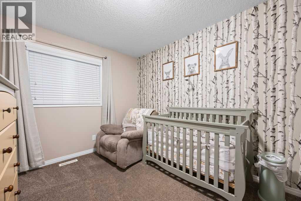 512 River Heights Green, Cochrane, Alberta  T4C 0S1 - Photo 26 - A2253650