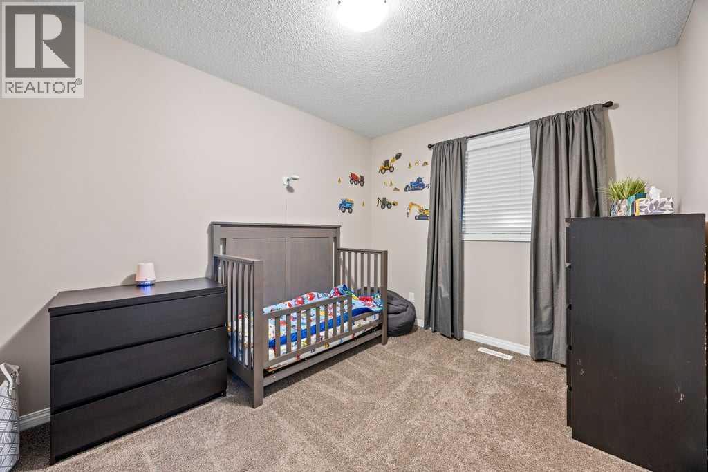 512 River Heights Green, Cochrane, Alberta  T4C 0S1 - Photo 27 - A2253650