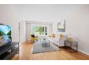 Living room with wood finished floors and baseboards