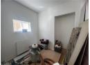 Dining area with radiator and wood finished floors