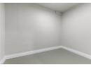 Spare room featuring concrete flooring