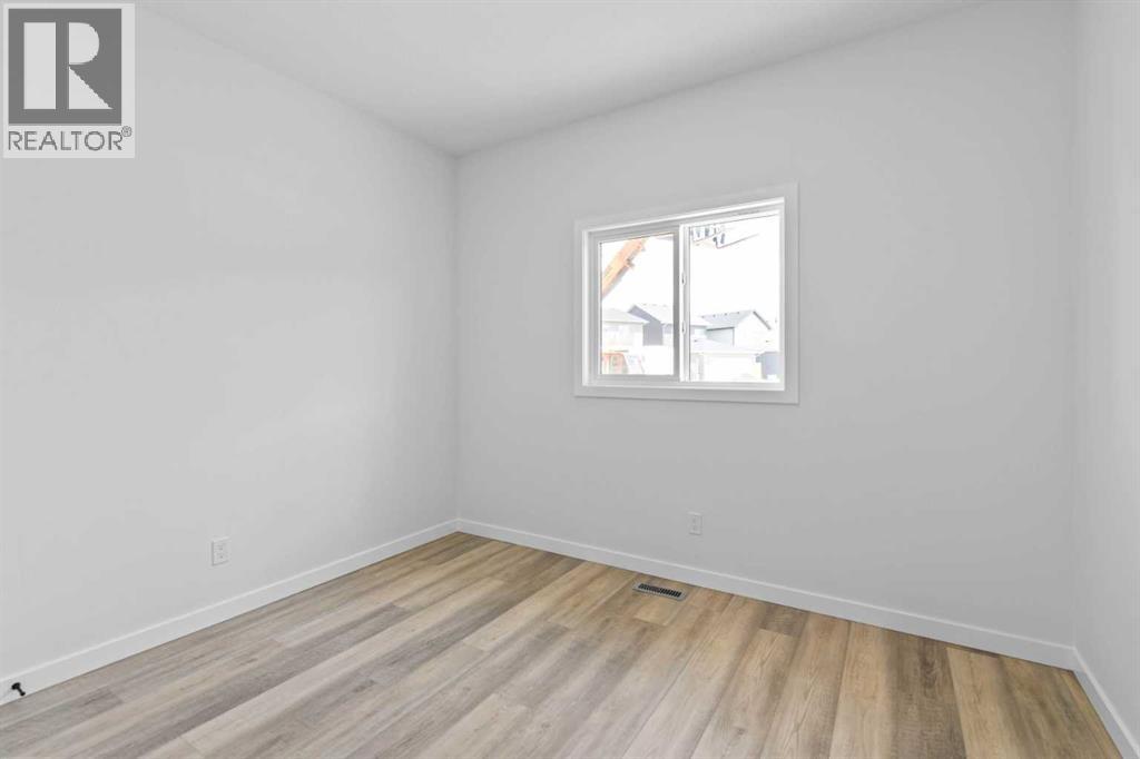 337 Ellen Park, Crossfield, Alberta  T0M 0S0 - Photo 19 - A2201069