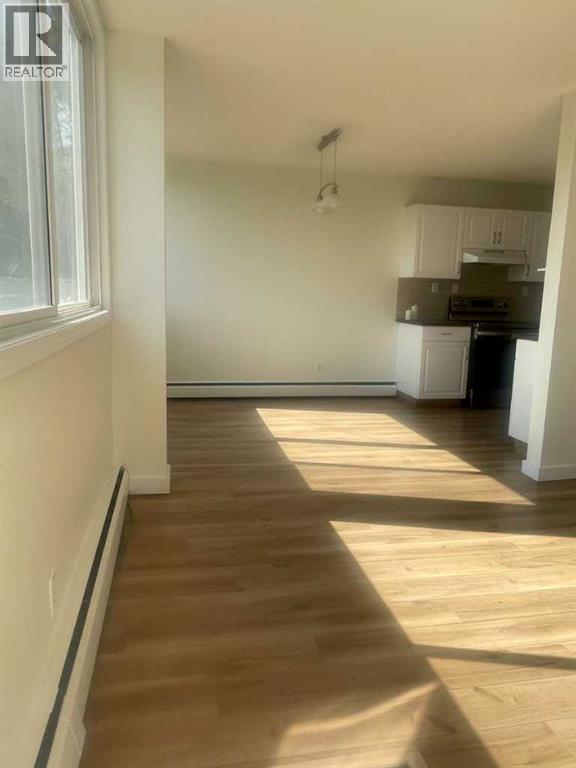 101, 607 69 Avenue Sw, Calgary, Alberta  T2V 0P1 - Photo 6 - A2257943