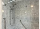 Bathroom with a tile shower
