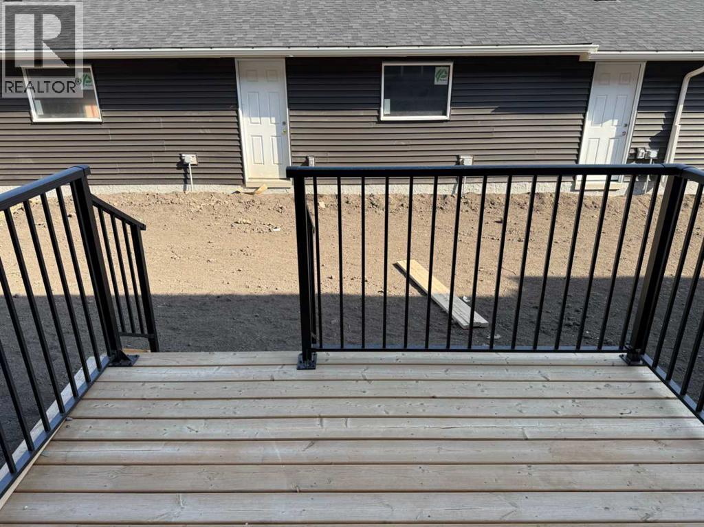 318 Sundown Road, Cochrane, Alberta  T4C 3H2 - Photo 20 - A2258128