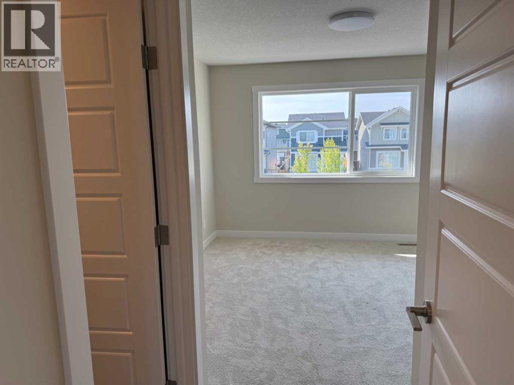 318 Sundown Road, Cochrane, Alberta  T4C 3H2 - Photo 28 - A2258128