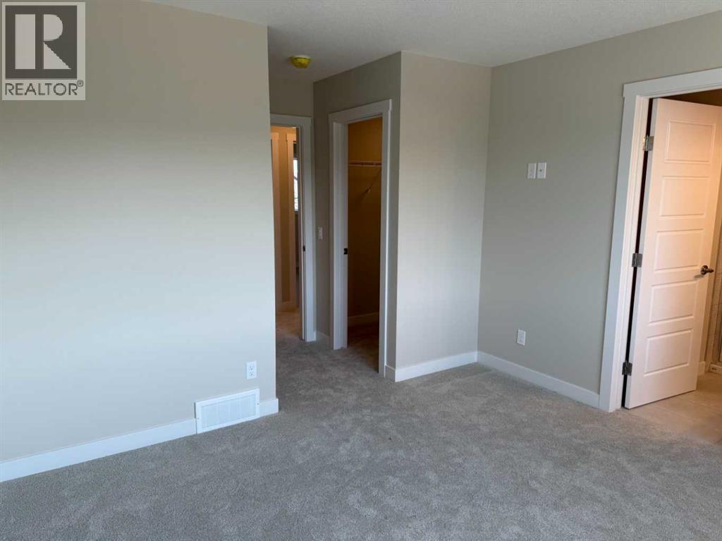 318 Sundown Road, Cochrane, Alberta  T4C 3H2 - Photo 32 - A2258128