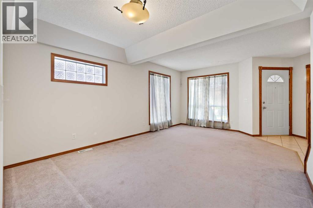 183 Cove Drive, Chestermere, Alberta  T1X 1E9 - Photo 7 - A2248417