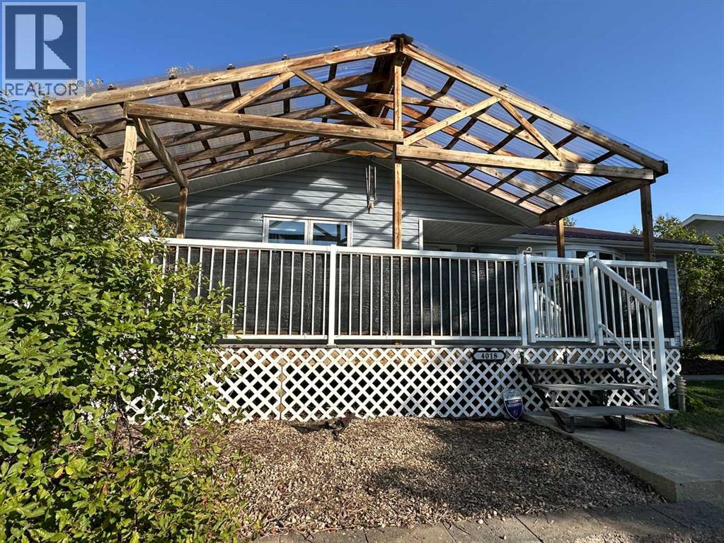 4018 39a Avenueclose, Ponoka, Alberta  T4J 1B1 - Photo 3 - A2242454