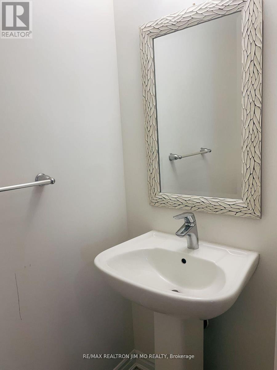 83 Sutcliffe Drive, Whitby, Ontario  L1R 0R4 - Photo 4 - E12416998