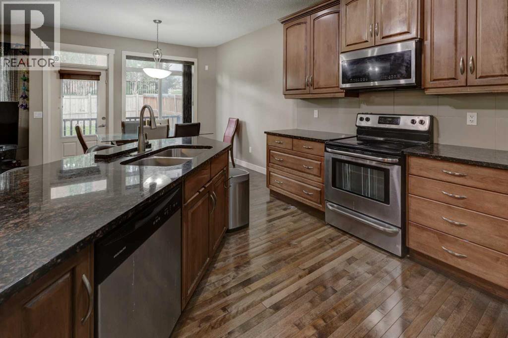 162 Sherwood Hill Nw, Calgary, Alberta  T3R 1P7 - Photo 7 - A2237445