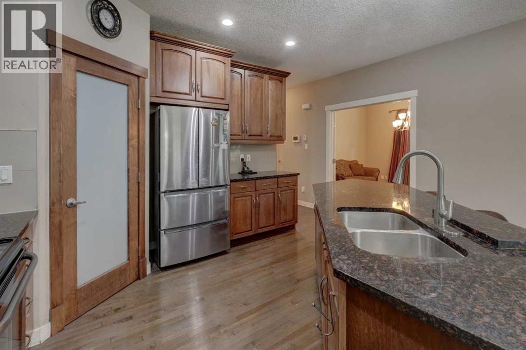 162 Sherwood Hill Nw, Calgary, Alberta  T3R 1P7 - Photo 8 - A2237445