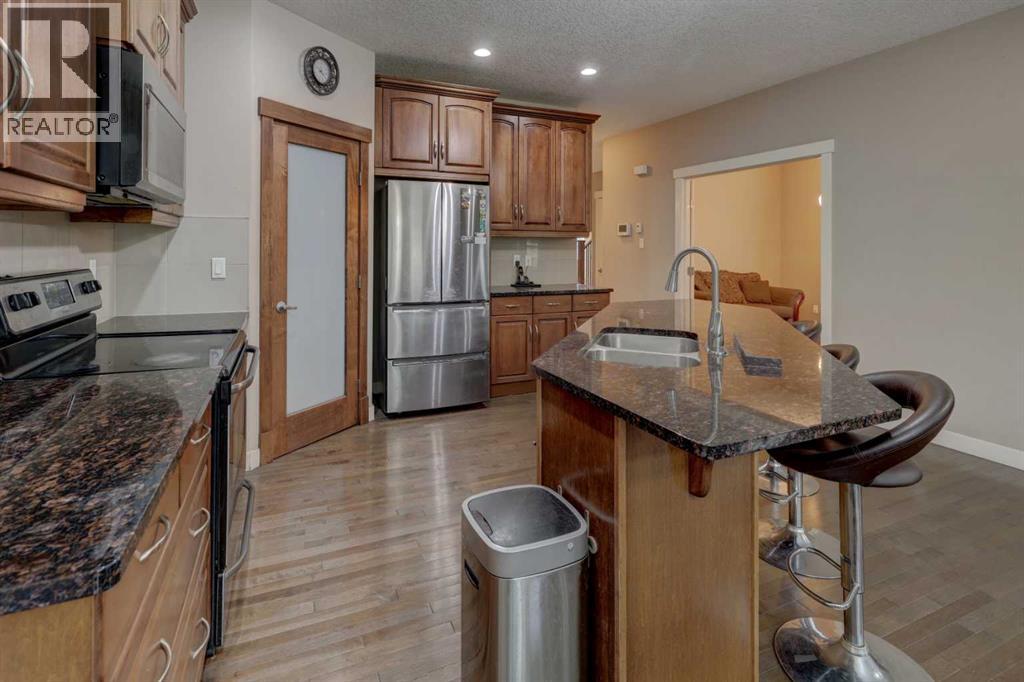 162 Sherwood Hill Nw, Calgary, Alberta  T3R 1P7 - Photo 6 - A2237445