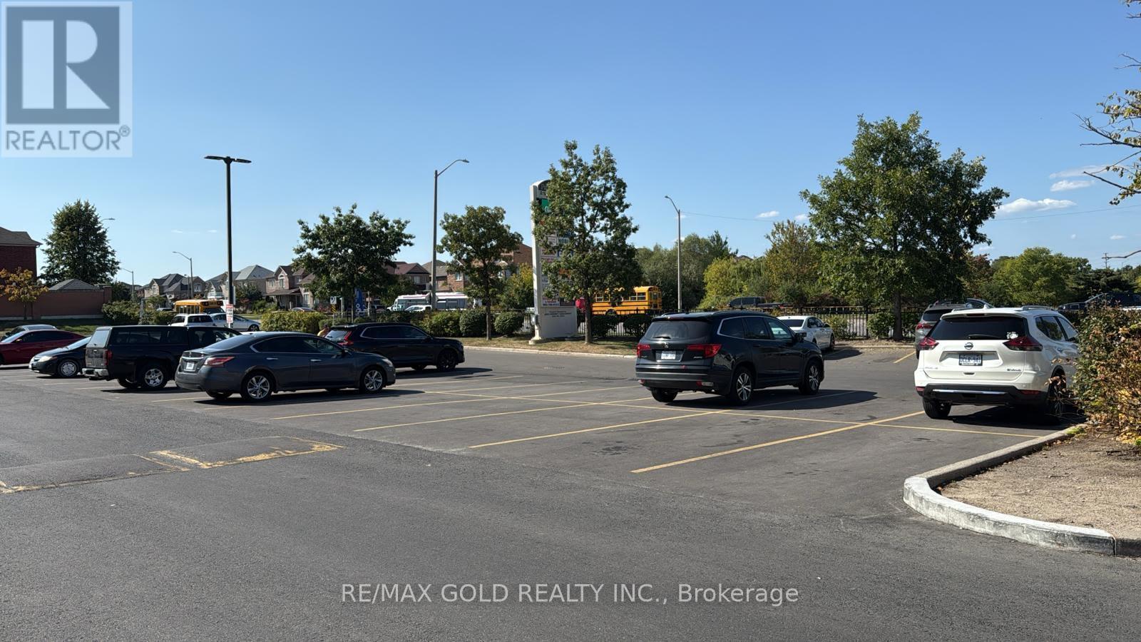 9 - 2945 Sandalwood Parkway, Brampton, Ontario  L6R 3J6 - Photo 1 - W12417044