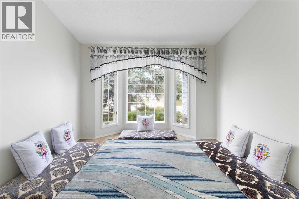 10316 Hidden Valley Drive Nw, Calgary, Alberta  T3A 4Z6 - Photo 4 - A2258562
