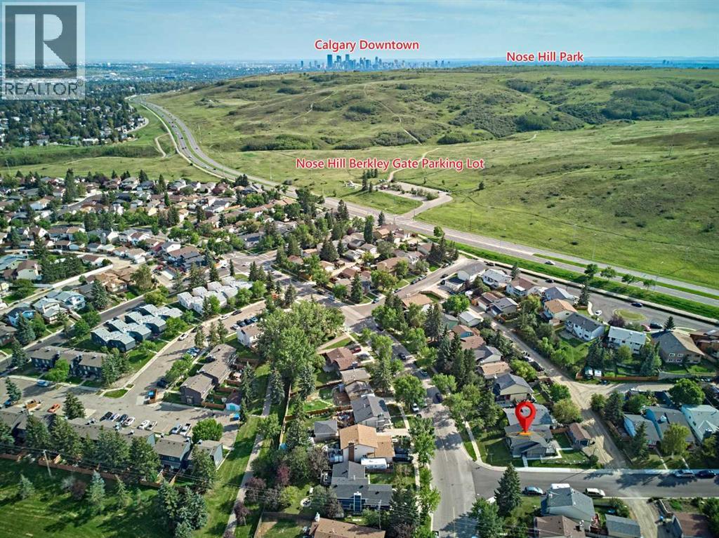 1371 Berkley Drive Nw, Calgary, Alberta  T3K 1T4 - Photo 1 - A2251076