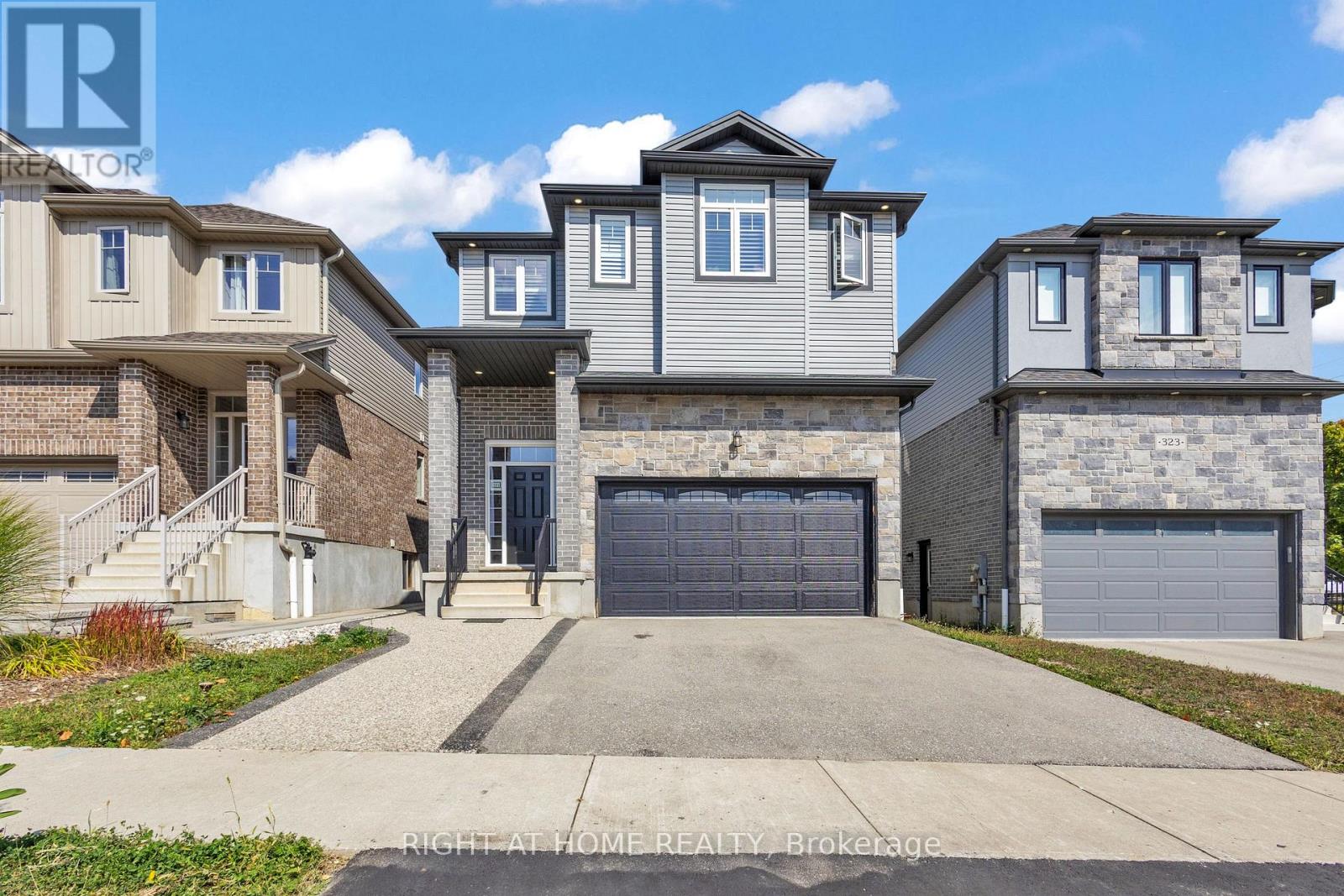321 Carriage Way, Waterloo, Ontario  N2K 0C2 - Photo 1 - X12417316