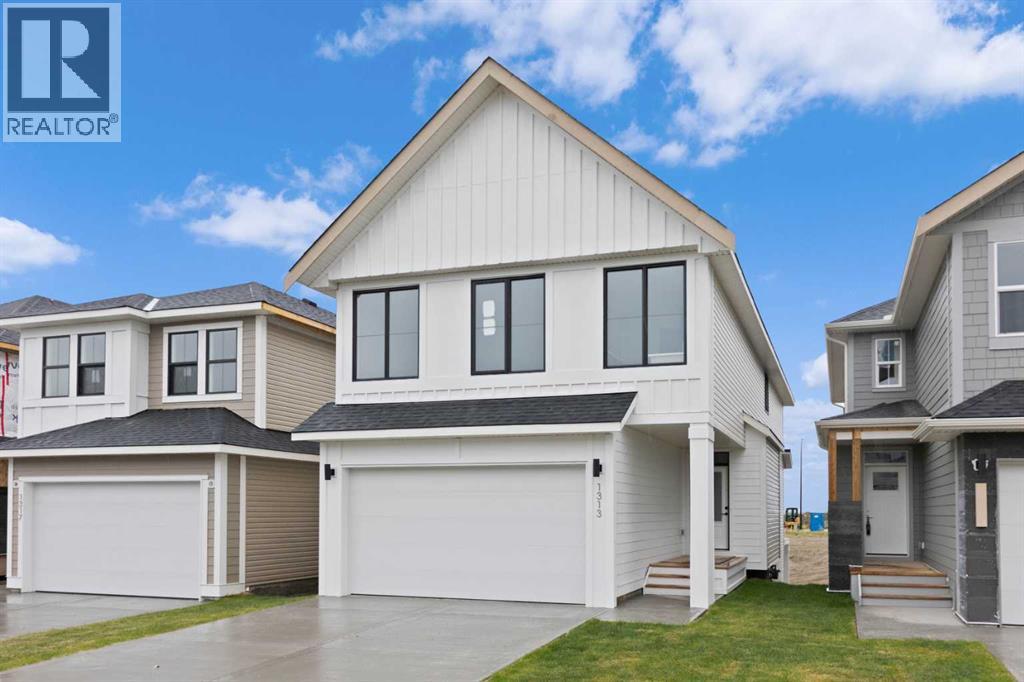1313 South Point Parade Sw, Airdrie, Alberta  T4B 5P3 - Photo 2 - A2207007