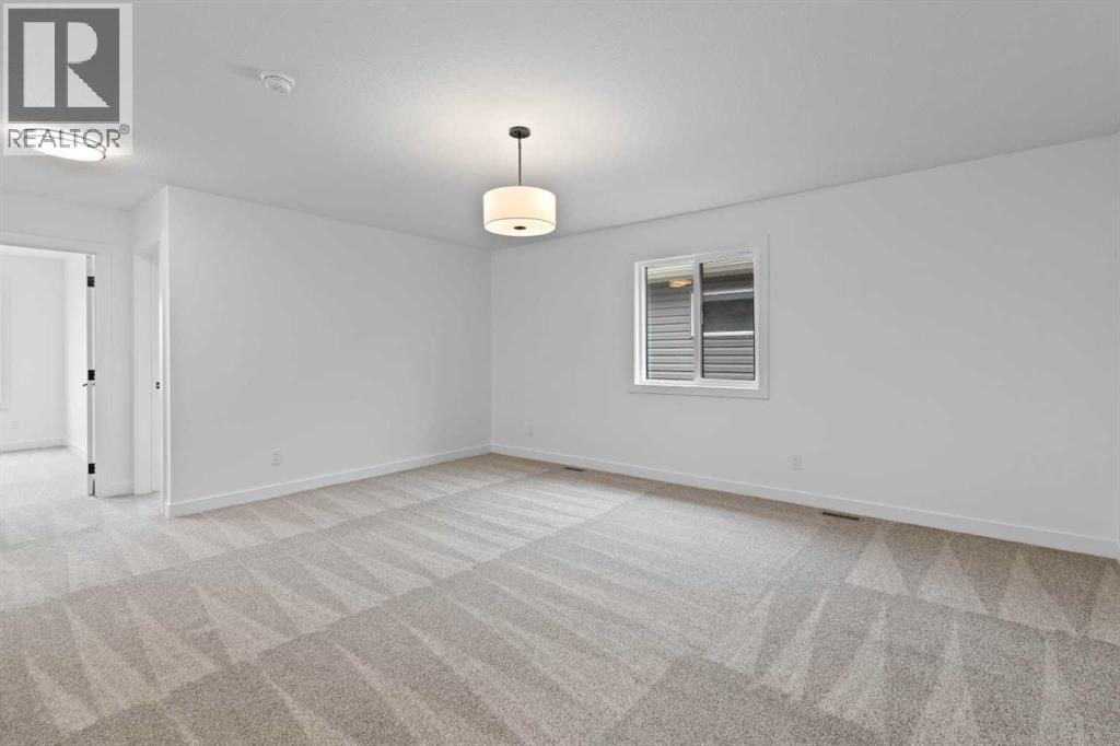 1313 South Point Parade Sw, Airdrie, Alberta  T4B 5P3 - Photo 29 - A2207007