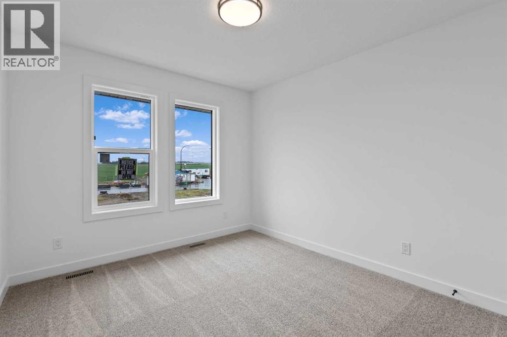 1313 South Point Parade Sw, Airdrie, Alberta  T4B 5P3 - Photo 34 - A2207007