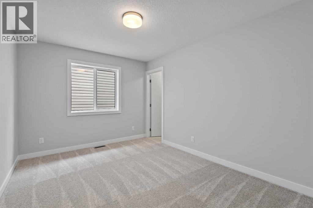 1309 South Point Parade Sw, Airdrie, Alberta  T4B 5H9 - Photo 2 - A2231344