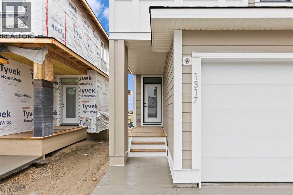 1317 South Point Parade Sw, Airdrie, Alberta  T4B 5H9 - Photo 2 - A2239089