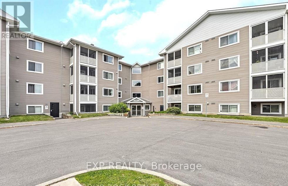 121 - 316 Lorry Greenberg Drive, Ottawa, Ontario  K1T 2P4 - Photo 2 - X12417822