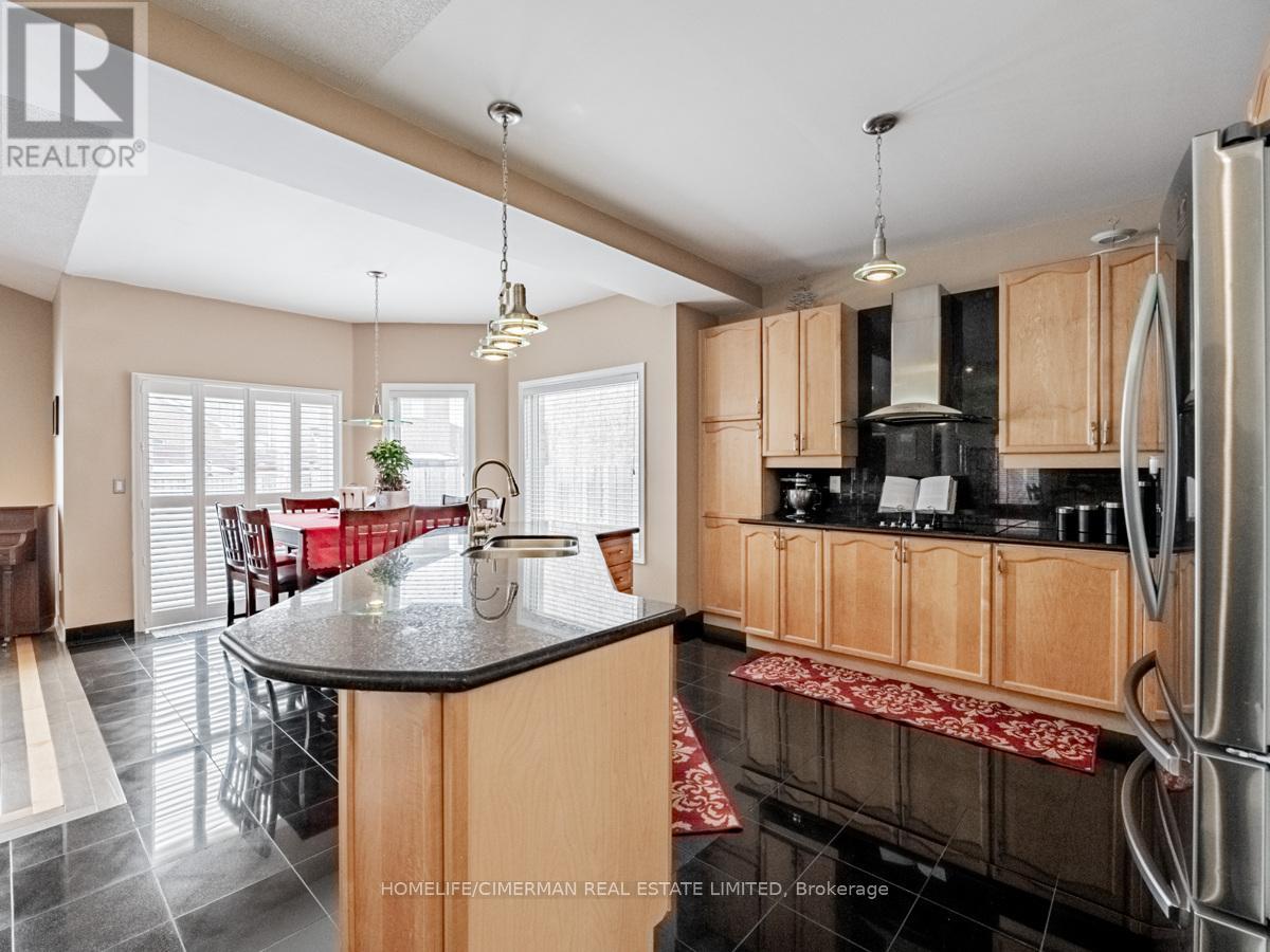 11 Chevrolet Drive, Brampton, Ontario  L7A 3C3 - Photo 6 - W12418117