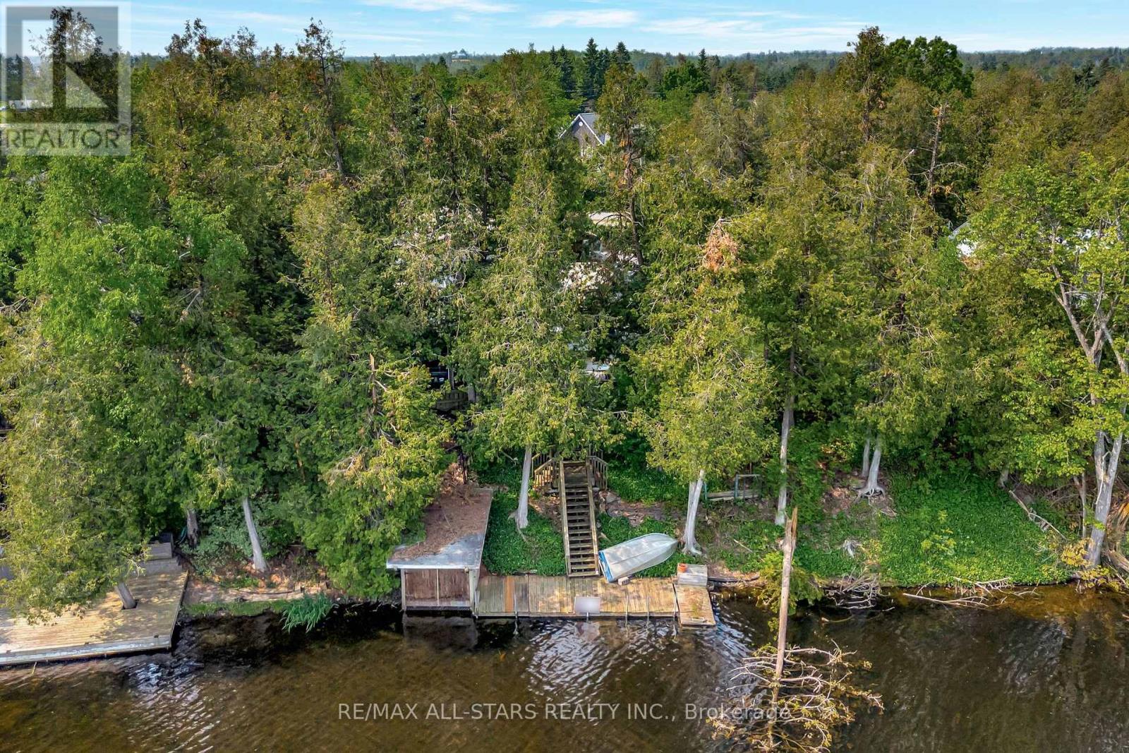 14 Wychwood Drive E, Kawartha Lakes, Ontario  K0M 1N0 - Photo 4 - X12384885