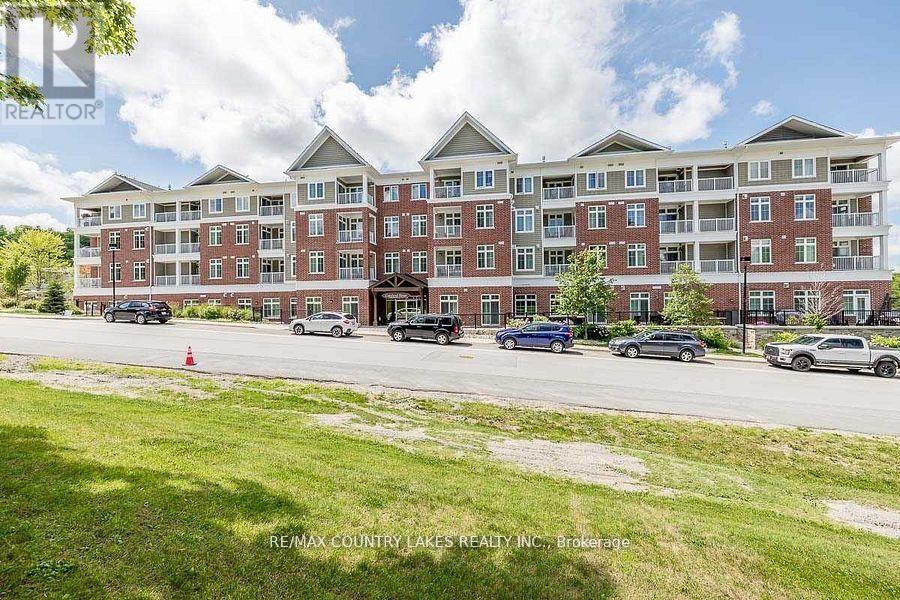 203 - 40 Horseshoe Boulevard, Oro-Medonte, Ontario  L4M 4Y8 - Photo 2 - S12418661