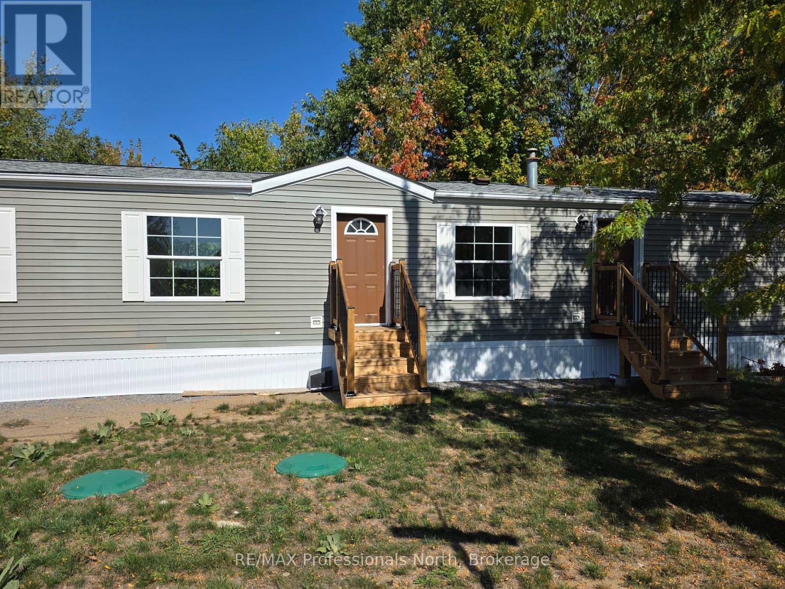 1013 Seventh Lane, Minden Hills (Lutterworth), Ontario  K0M 2K0 - Photo 2 - X12419120