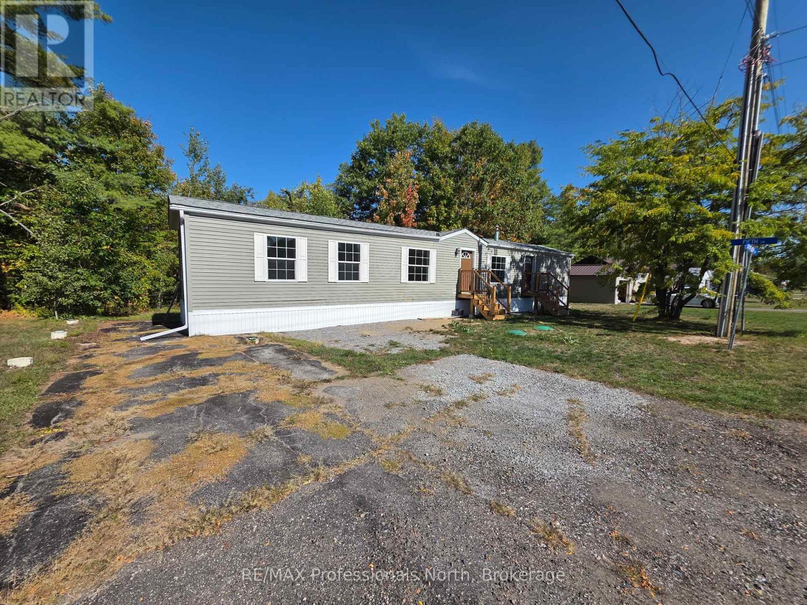 1013 Seventh Lane, Minden Hills (Lutterworth), Ontario  K0M 2K0 - Photo 3 - X12419120