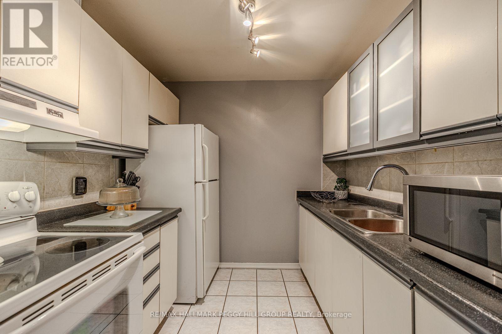 E9 - 167 Edgehill Drive, Barrie, Ontario  L4N 1L9 - Photo 4 - S12418991