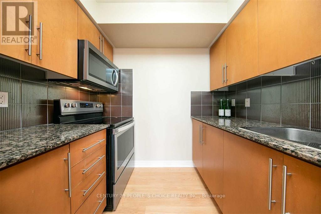 2312 - 310 Burnhamthorpe Road W, Mississauga, Ontario  L5B 4P9 - Photo 13 - W12419014