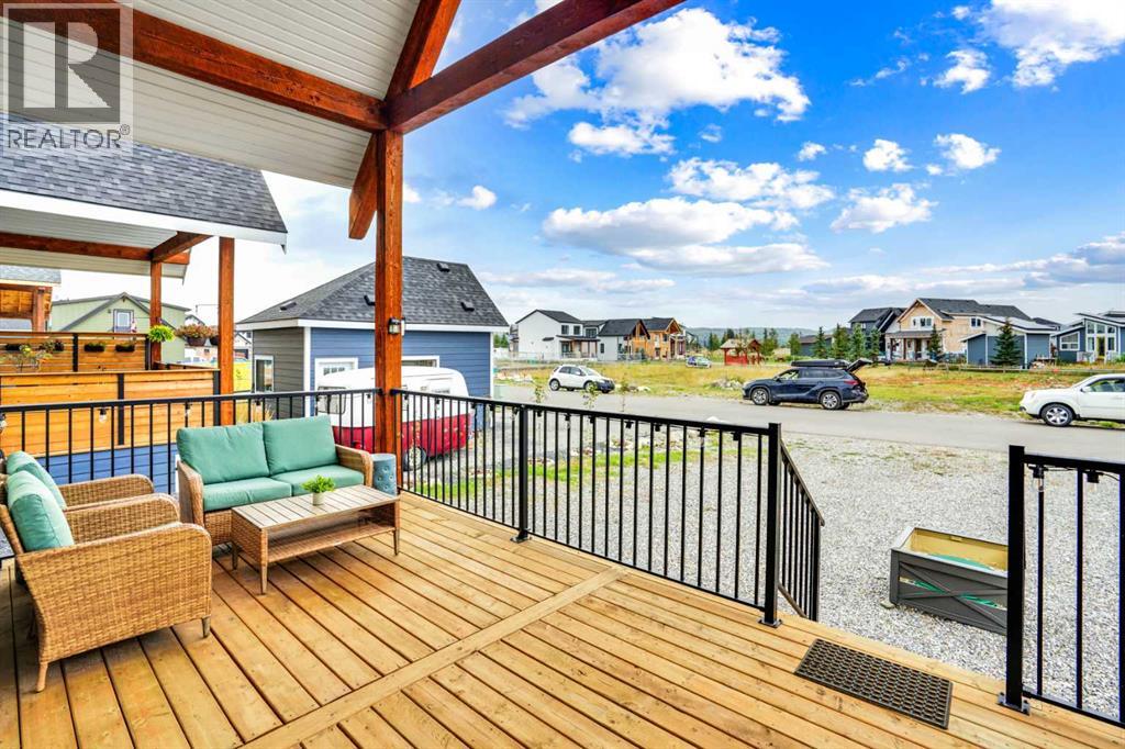 44 Cottageclub Lane, Rural Rocky View County, Alberta  T4C 1B1 - Photo 3 - A2258679