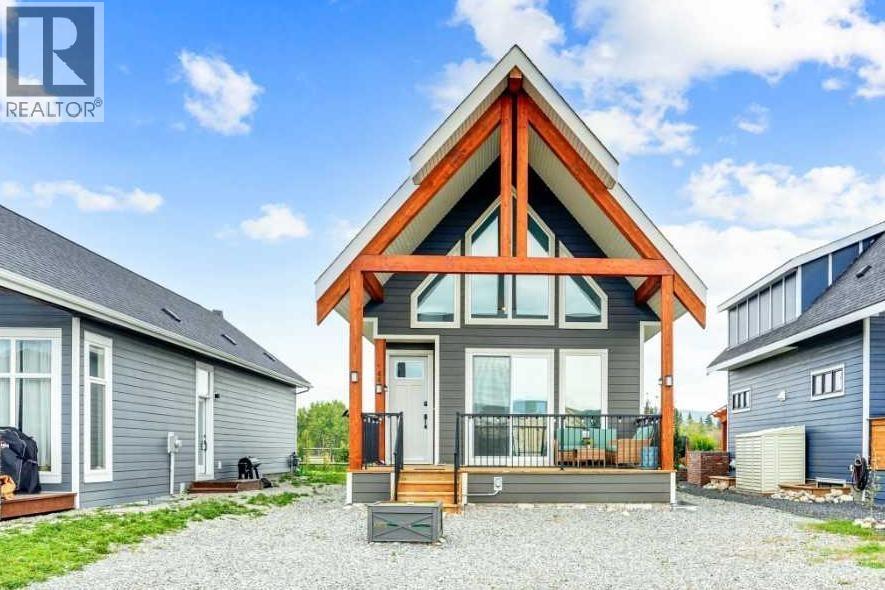 44 Cottageclub Lane, Rural Rocky View County, Alberta  T4C 1B1 - Photo 2 - A2258679
