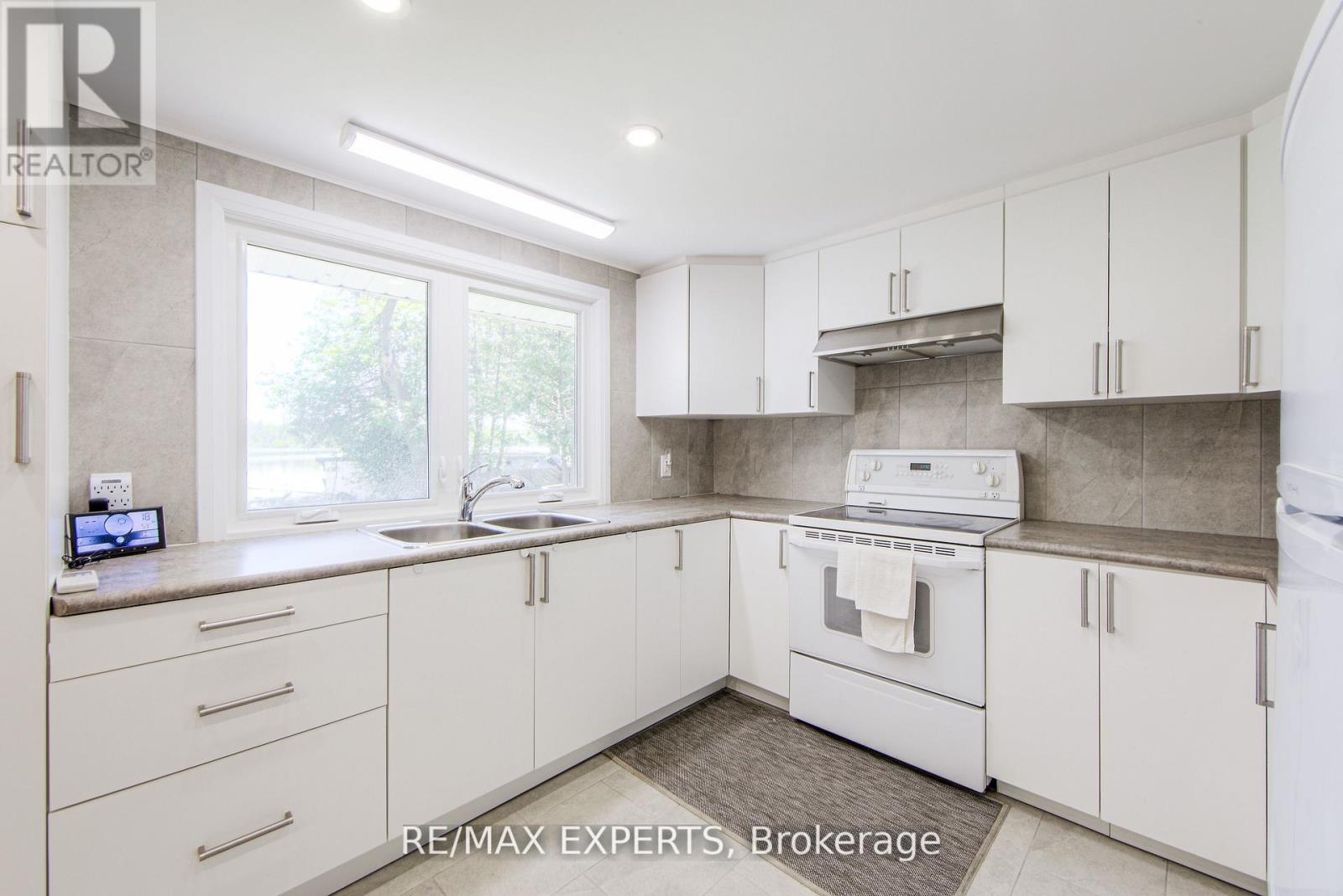 24 Riverside Drive, Kawartha Lakes, Ontario  K9V 0H6 - Photo 28 - X12419414
