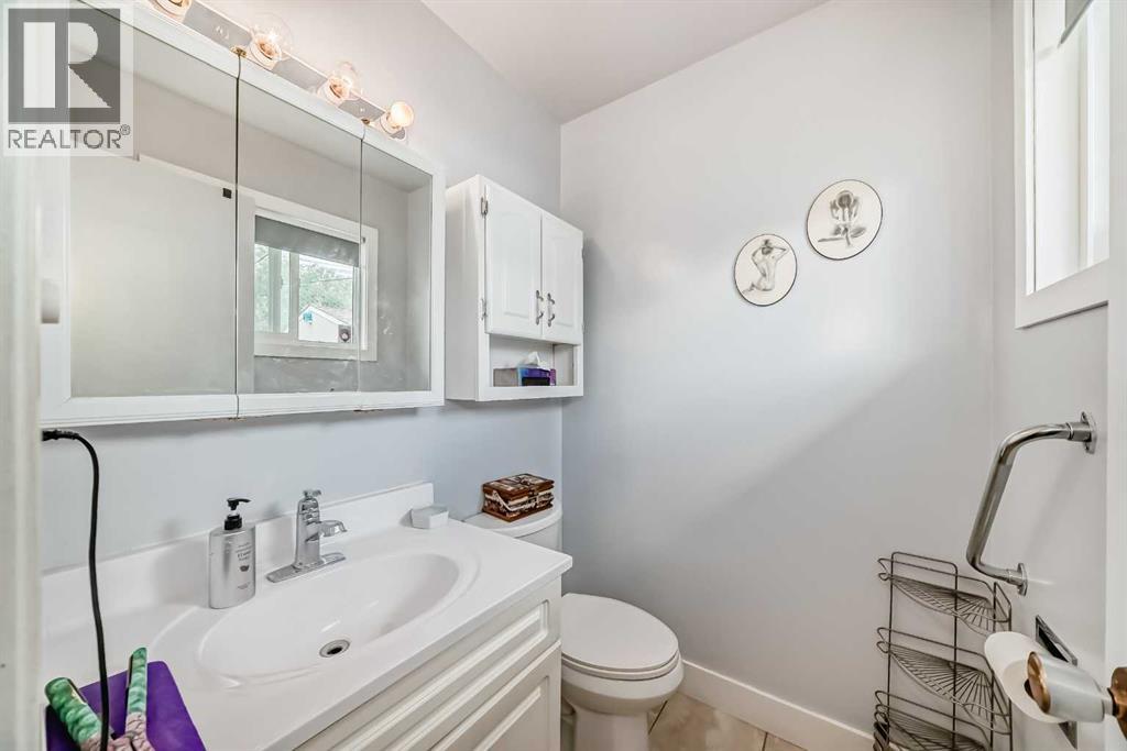 1004 Hunterston Hill Nw, Calgary, Alberta  T2K 4N8 - Photo 20 - A2237324