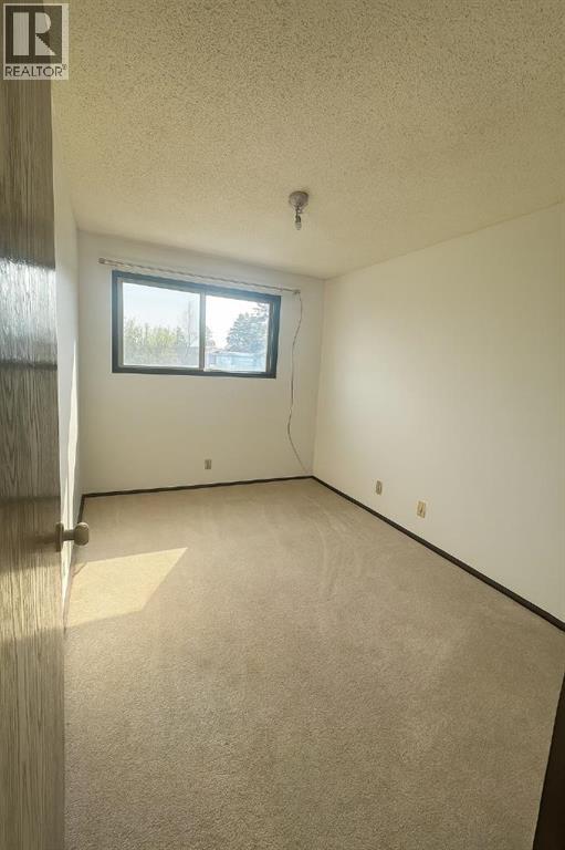 3, 11 Blackthorn Bay Ne, Calgary, Alberta  T2K 5L4 - Photo 8 - A2257764