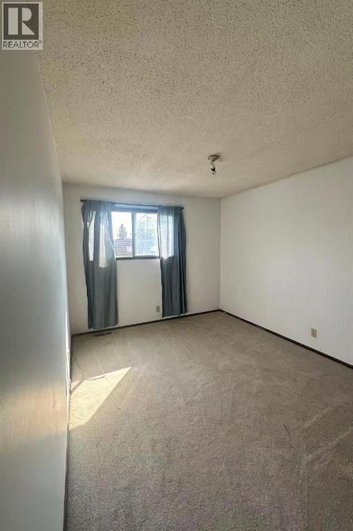 3, 11 Blackthorn Bay Ne, Calgary, Alberta  T2K 5L4 - Photo 10 - A2257764