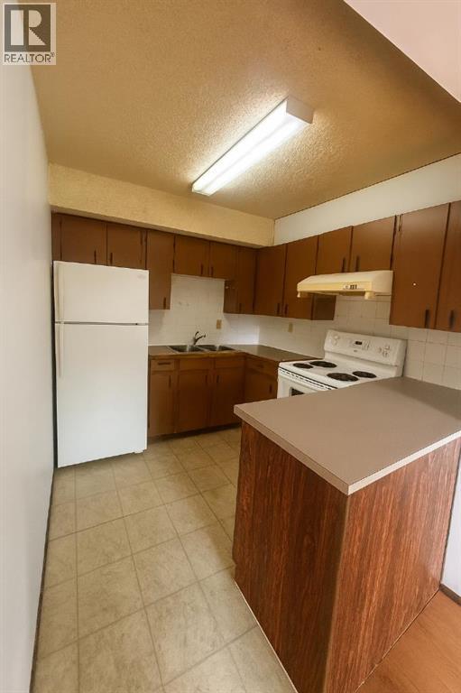 3, 11 Blackthorn Bay Ne, Calgary, Alberta  T2K 5L4 - Photo 5 - A2257764