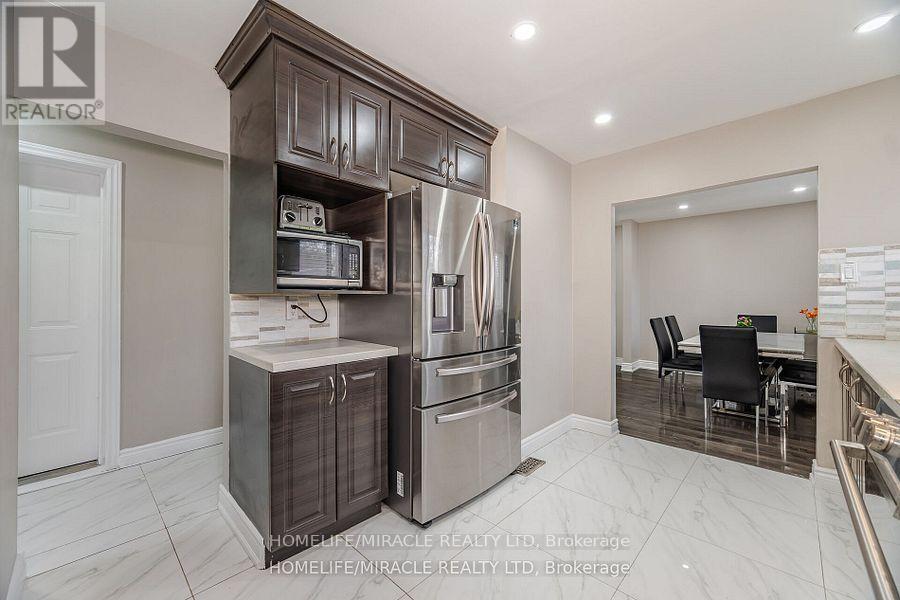 345 Silverstone Drive, Toronto, Ontario  M9V 3J8 - Photo 11 - W12374004