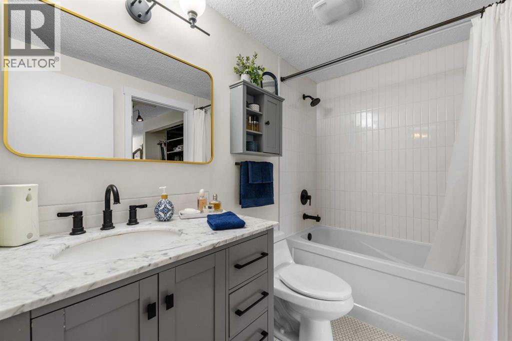 210 Queenston Heights Se, Calgary, Alberta  T2J 6L1 - Photo 21 - A2257844