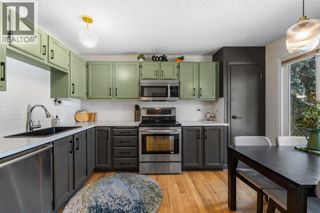 210 Queenston Heights Se, Calgary, Alberta  T2J 6L1 - Photo 11 - A2257844